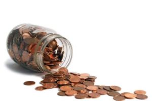 Pennies spilling out of a jar