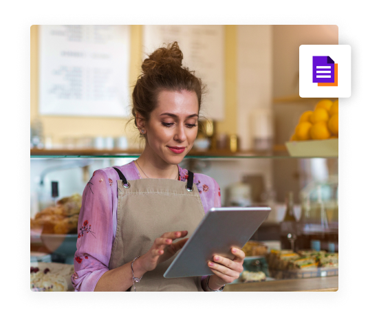 RASI Reporting restaurant employee looking at restaurant reports on tablet