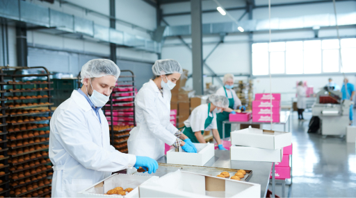 Workers in food manufacturing plant