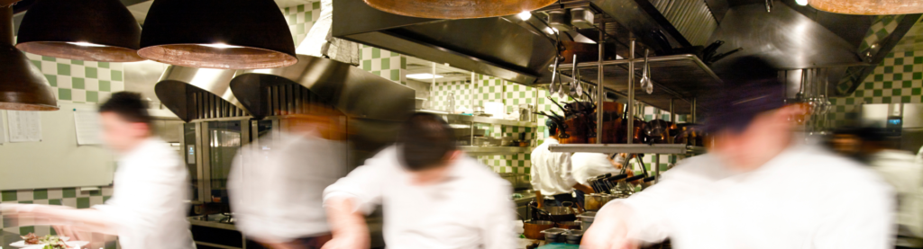 Busy restaurant kitchen during serivce