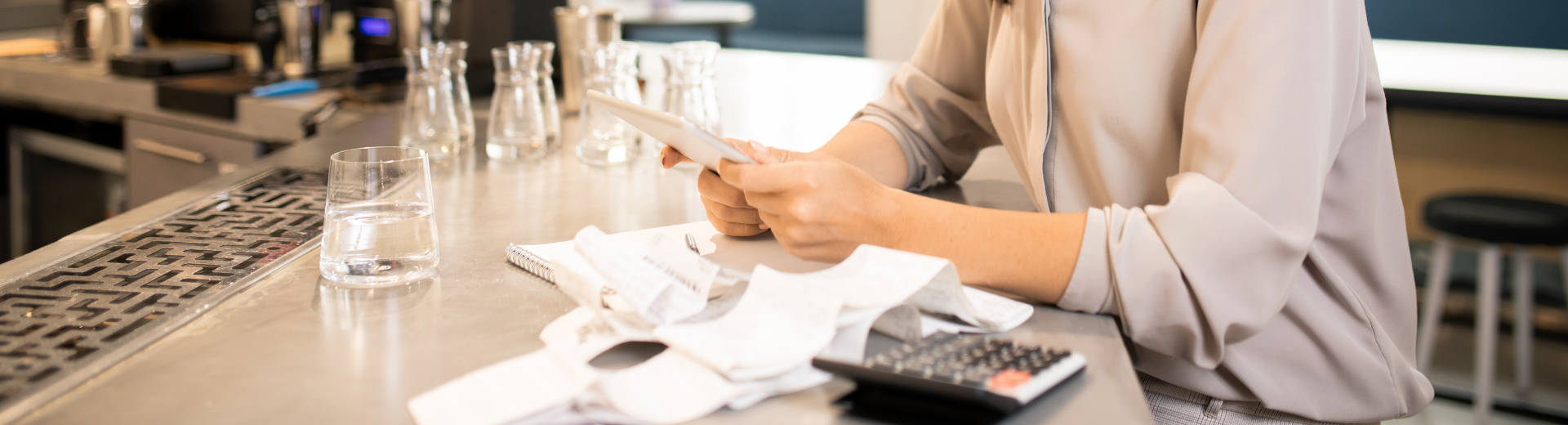 Restaurant owner calculating notes payables