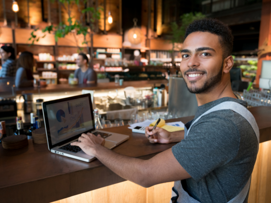 Restaurant team member smiling at camera